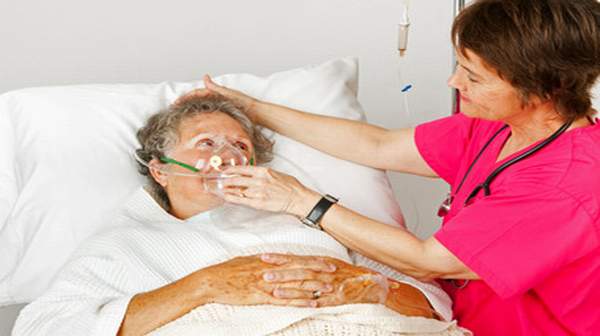 senior woman with nurse pneumonia